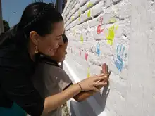 Con Mi Cali Bonita 223 niños y niñas pintaron mural en los alrededores de la Alameda de Siloé