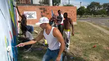 Habitantes de Potrero Grande pintan sin fronteras