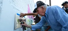 Más que pintura y color, paz y reconciliación en los muros de la Comuna 20