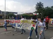 Entre pasos y voces jóvenes de las comunas 13 y 14 le apuestan a la paz y a la reconciliación