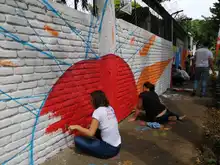 Mural le cambió la cara a un colegio en Las Delicias con Urban 95