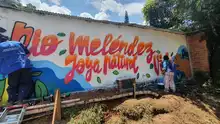 Con arte urbano, en Villacarmelo convocan a respetar al río Meléndez