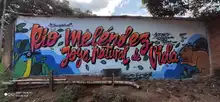 Con arte urbano, en Villacarmelo convocan a respetar al río Meléndez
