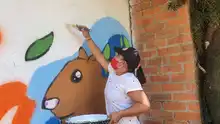 Con arte urbano, en Villacarmelo convocan a respetar al río Meléndez