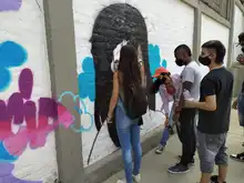 Con mensajes de cultura ciudadana, Graficalia transforma espacios de la Comuna 18