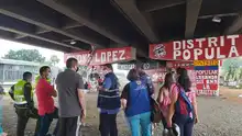 Mesa de Dialogo con voceros de barras del américa que llevan a cabo intervención de pintura en el puente de la calle 26 con autopista.