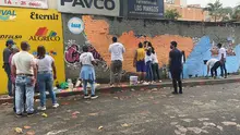 Jóvenes de la comuna 18 pintaron un regalo para Cali