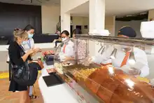 La industria caleña que busca exportar lechona con la Macrorrueda de Negocios
