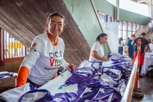 Entrega de kits le puso movimiento al preámbulo de la Carrera de la Mujer 7K Ciclovida