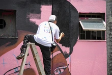 Festival Graficalia, Colores de Vida pintó la Avenida 6ta de Cali con su Mural Gozate la sexta, ¡vé!