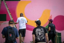 Festival Graficalia, Colores de Vida pintó la Avenida 6ta de Cali con su Mural Gozate la sexta, ¡vé!