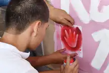 Secretaría de Vivienda se une a la campaña ‘Manos Rojas’ por la  protección de la niñez en el colegio Llano Verde
