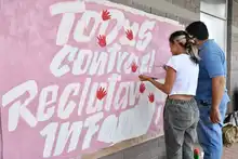 Secretaría de Vivienda se une a la campaña ‘Manos Rojas’ por la  protección de la niñez en el colegio Llano Verde