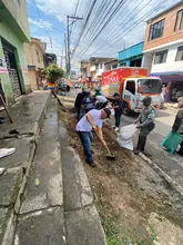 La renovada imagen del barrio Cortijo tras un masivo operativo de limpieza en un punto crítico de basuras