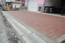 Cali acelera su recuperación: ya se están adoquinando las vías del barrio Obrero 