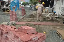 Cali acelera su recuperación: ya se están adoquinando las vías del barrio Obrero 