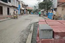 Cali acelera su recuperación: ya se están adoquinando las vías del barrio Obrero 