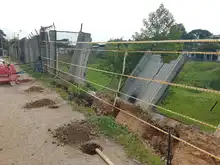 Alcaldía de Cali monitorea y articula plan de acción sobre muro de cerramiento en la Estación de Bombeo de Floralia