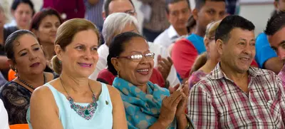 La 19, una comuna que floreció con canas