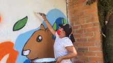 Con arte urbano, en Villacarmelo convocan a respetar al río Meléndez