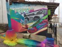 La comuna 20 fortalece el turismo coloreando la Calle de la Poesía